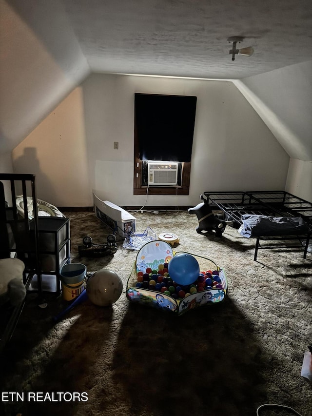 2395 Howard Rd, Bybee, TN 37713 - bonus room with vaulted ceiling, carpet, and cooling unit