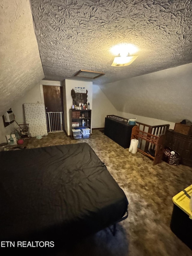 2395 Howard Rd, Bybee, TN 37713 - bedroom featuring vaulted ceiling, a textured ceiling, and carpet