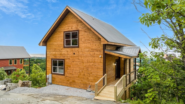 2251 Fox Berry Way, Sevierville, TN 37876 - rear view of house with a metal roof and a standing seam roof