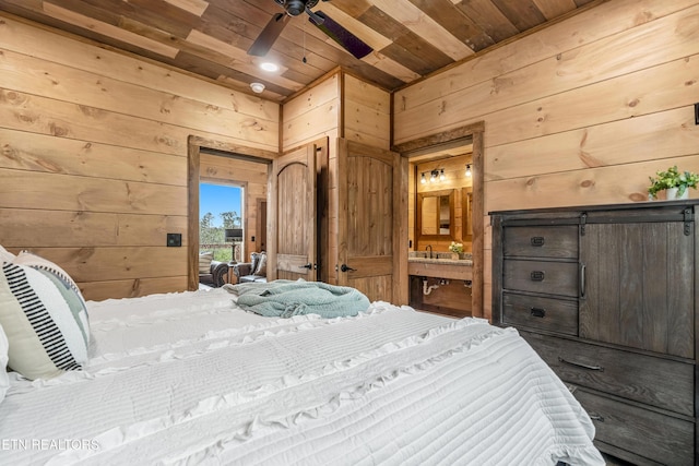 2251 Fox Berry Way, Sevierville, TN 37876 - bedroom with wooden ceiling and wood walls