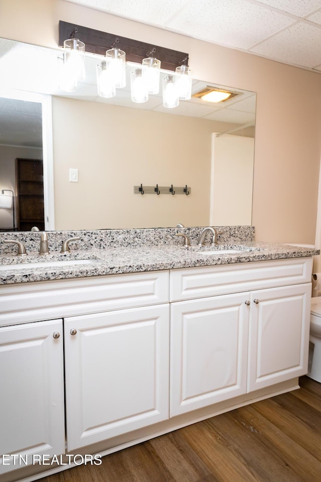 3815 E E Pkwy Apt 13, Gatlinburg, TN 37738 - bathroom featuring double vanity and wood finished floors