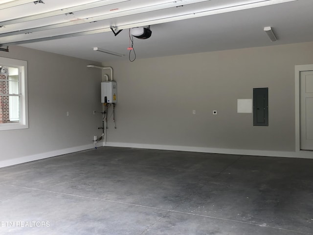 85 Royal Troon Cir, Oak Ridge, TN 37830 - garage featuring electric panel, tankless water heater, and a garage door opener