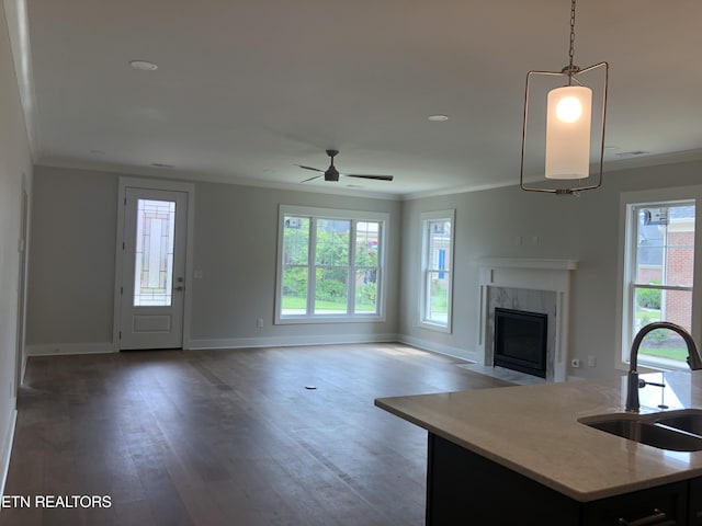 85 Royal Troon Cir, Oak Ridge, TN 37830 - living room with crown molding, a high end fireplace, a ceiling fan, wood finished floors, and recessed lighting