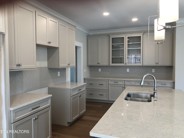 85 Royal Troon Cir, Oak Ridge, TN 37830 - kitchen featuring gray cabinets, dark wood finished floors, crown molding, glass insert cabinets, and tasteful backsplash