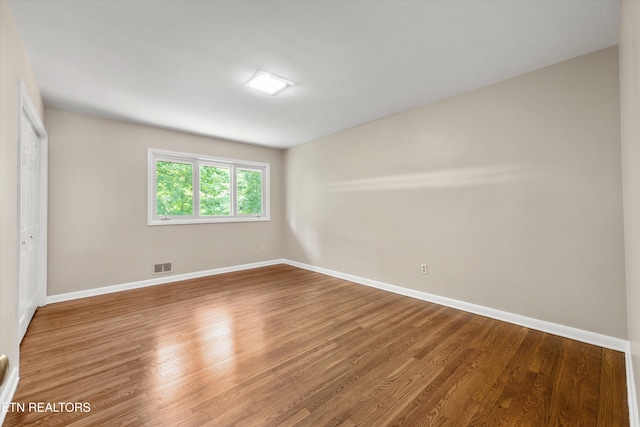 386 E Dr, Oak Ridge, TN 37830 - spare room with wood finished floors and baseboards
