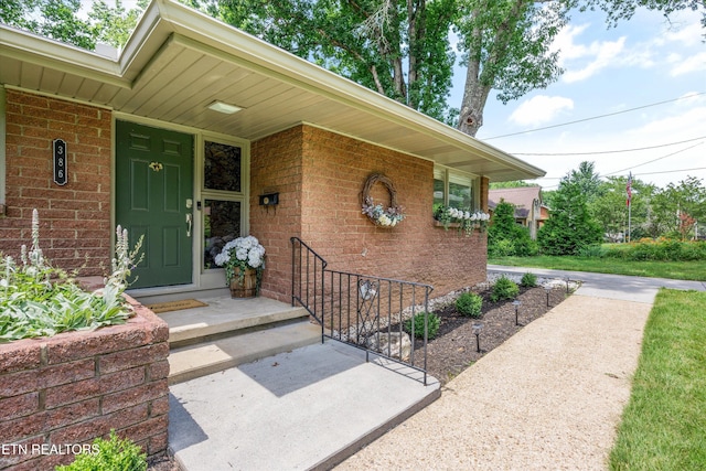 386 E Dr, Oak Ridge, TN 37830 - doorway to property featuring brick siding