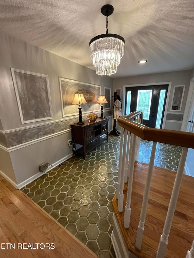 242 Adams Ln, Jellico, TN 37762 - hallway with a chandelier, a textured ceiling, and recessed lighting