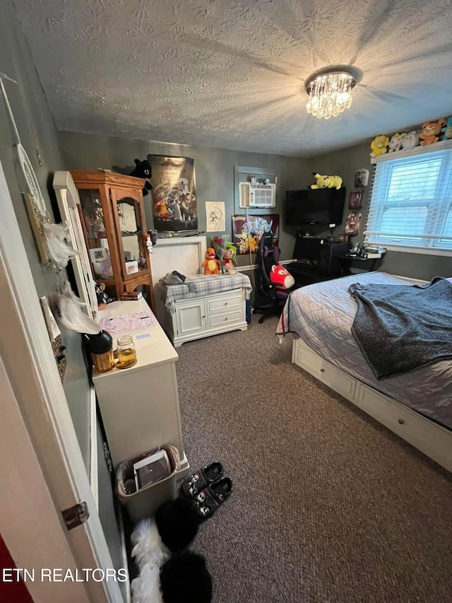 242 Adams Ln, Jellico, TN 37762 - carpeted bedroom with a textured ceiling and an AC wall unit