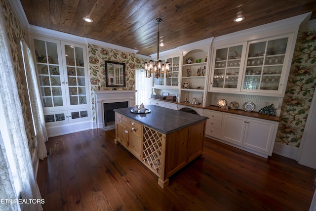 2590 Day Rd, Strawberry Plains, TN 37871 - kitchen featuring wallpapered walls, dark countertops, open shelves, wooden ceiling, and dark wood-style flooring