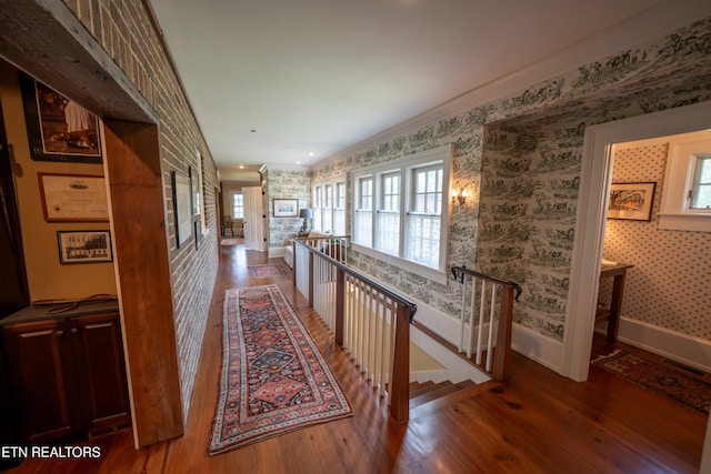 2590 Day Rd, Strawberry Plains, TN 37871 - corridor with wood finished floors, plenty of natural light, wallpapered walls, an upstairs landing, and crown molding