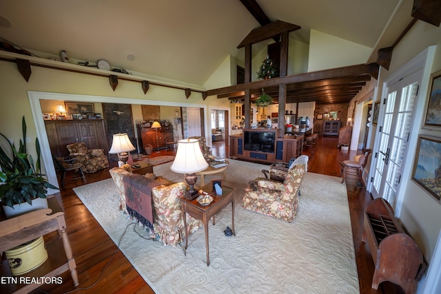 2590 Day Rd, Strawberry Plains, TN 37871 - living room with french doors, beam ceiling, wood finished floors, plenty of natural light, and high vaulted ceiling