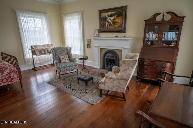 2590 Day Rd, Strawberry Plains, TN 37871 - living room with crown molding, a fireplace with flush hearth, and hardwood / wood-style floors