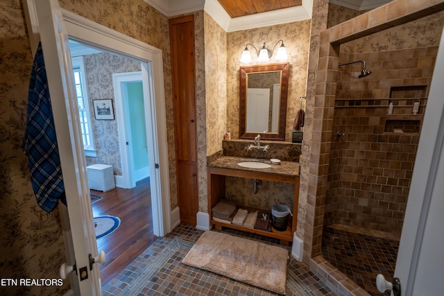 2590 Day Rd, Strawberry Plains, TN 37871 - bathroom featuring wallpapered walls, crown molding, a tile shower, and vanity