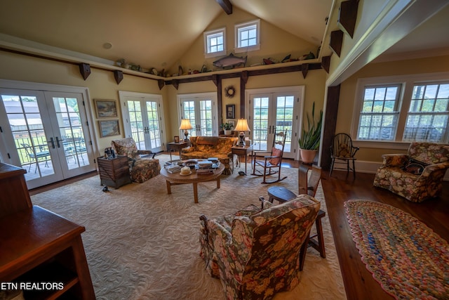 2590 Day Rd, Strawberry Plains, TN 37871 - living area featuring french doors, wood finished floors, high vaulted ceiling, and beamed ceiling
