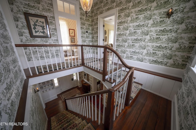 2590 Day Rd, Strawberry Plains, TN 37871 - stairway with wallpapered walls, wood-type flooring, and healthy amount of natural light