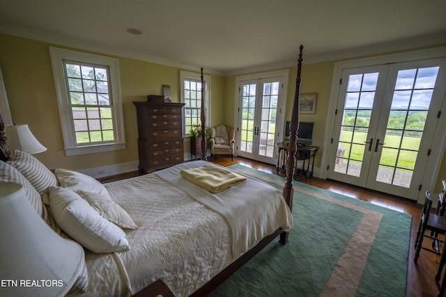2590 Day Rd, Strawberry Plains, TN 37871 - bedroom with french doors, access to exterior, ornamental molding, and wood finished floors