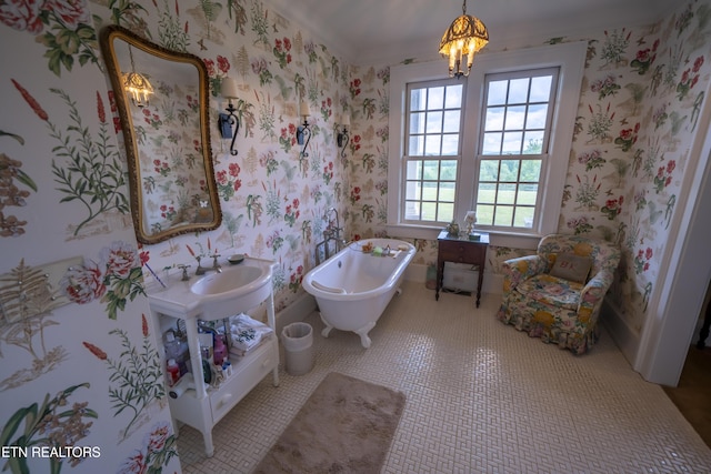 2590 Day Rd, Strawberry Plains, TN 37871 - full bath with a soaking tub, wallpapered walls, and a chandelier