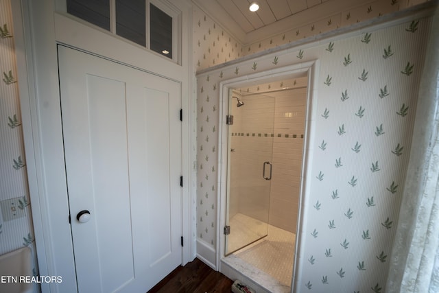 2590 Day Rd, Strawberry Plains, TN 37871 - full bath featuring wallpapered walls, a stall shower, and wood finished floors