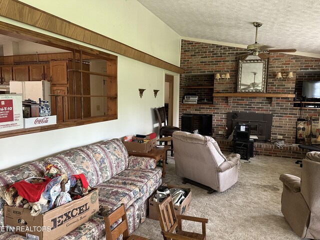 165 Bud Hatmaker Ln, Lafollette, TN 37766 - living room with lofted ceiling, a wood stove, carpet flooring, a textured ceiling, and a ceiling fan