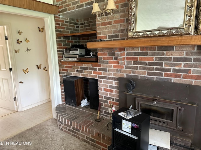 165 Bud Hatmaker Ln, Lafollette, TN 37766 - detailed view of a brick fireplace and baseboards