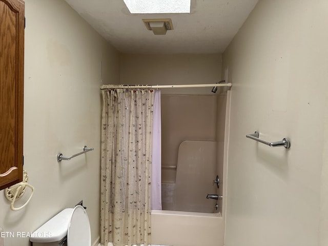 165 Bud Hatmaker Ln, Lafollette, TN 37766 - full bathroom featuring shower / bathtub combination with curtain and toilet