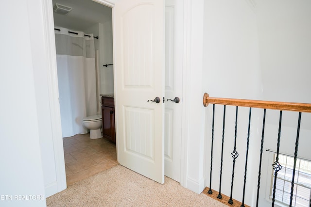 7481 Nightfall Cir, Ooltewah, TN 37363 - bathroom with curtained shower and toilet