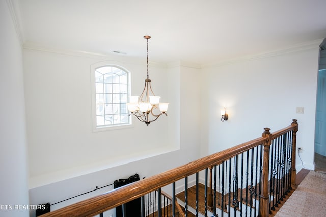 7481 Nightfall Cir, Ooltewah, TN 37363 - hall with a chandelier, ornamental molding, an upstairs landing, and wood finished floors