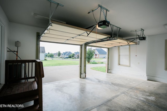7481 Nightfall Cir, Ooltewah, TN 37363 - garage featuring a garage door opener