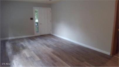 100 Nasson Ln, Oak Ridge, TN 37830 - spare room featuring wood finished floors and baseboards