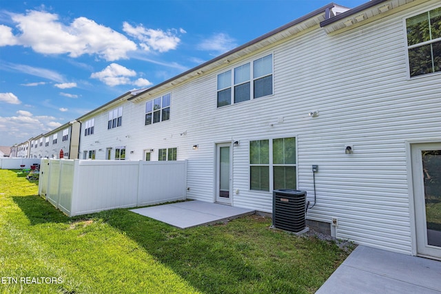 205 Harper Village Way, Lenoir City, TN 37771 - rear view of house featuring a patio