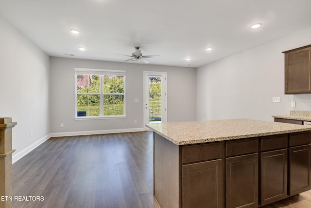 205 Harper Village Way, Lenoir City, TN 37771 - kitchen featuring ceiling fan, dark wood-style floors, recessed lighting, light stone countertops, and dark brown cabinetry