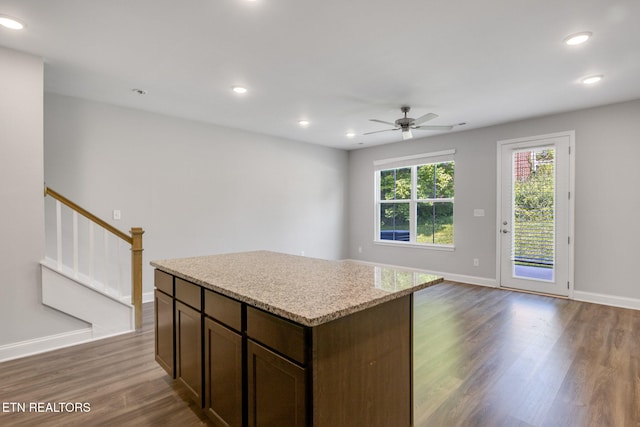 205 Harper Village Way, Lenoir City, TN 37771 - kitchen with dark wood-type flooring, a ceiling fan, dark brown cabinets, a center island, and recessed lighting