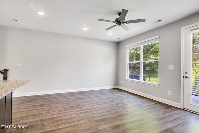 205 Harper Village Way, Lenoir City, TN 37771 - unfurnished living room featuring dark wood-type flooring, ceiling fan, and recessed lighting