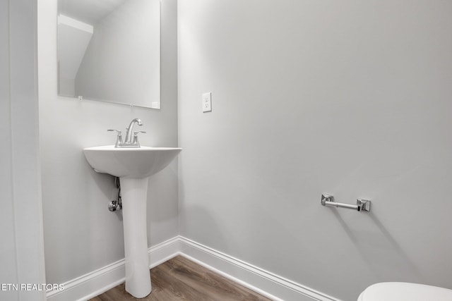 205 Harper Village Way, Lenoir City, TN 37771 - bathroom with baseboards and wood finished floors