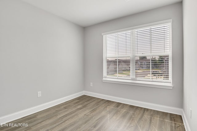 205 Harper Village Way, Lenoir City, TN 37771 - empty room with wood finished floors and baseboards