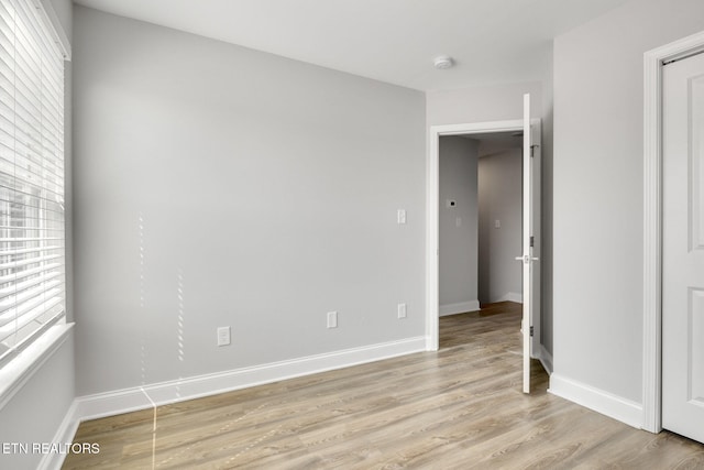 205 Harper Village Way, Lenoir City, TN 37771 - empty room with light wood-style flooring and baseboards