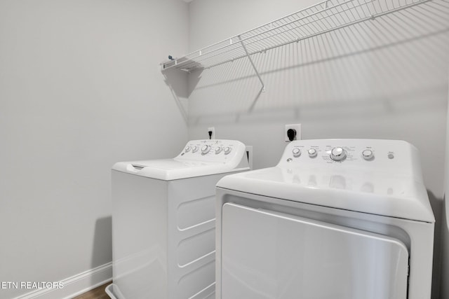 205 Harper Village Way, Lenoir City, TN 37771 - laundry room featuring washer and dryer and baseboards