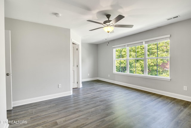205 Harper Village Way, Lenoir City, TN 37771 - empty room featuring a smoke detector, dark wood-style floors, and a ceiling fan