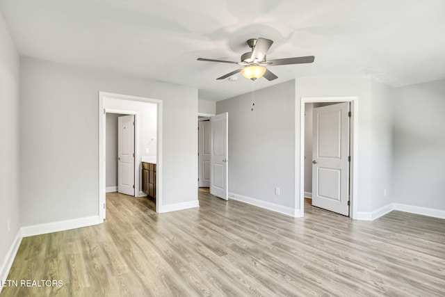 205 Harper Village Way, Lenoir City, TN 37771 - unfurnished bedroom with light wood finished floors and a ceiling fan
