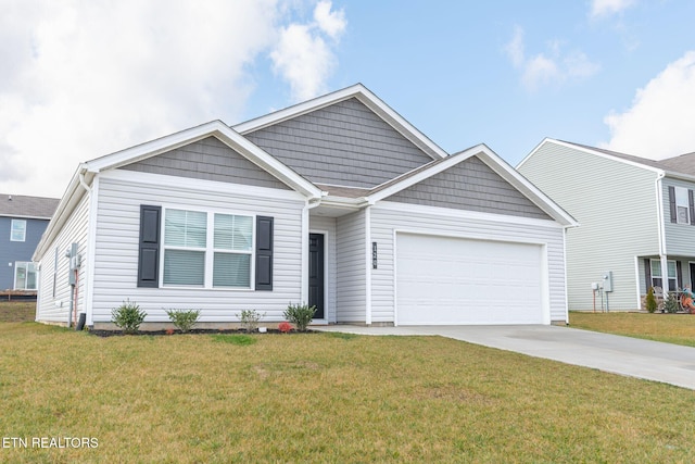 120 Riley Ct, Maynardville, TN 37807 - view of front of home featuring a garage, concrete driveway, and a front yard