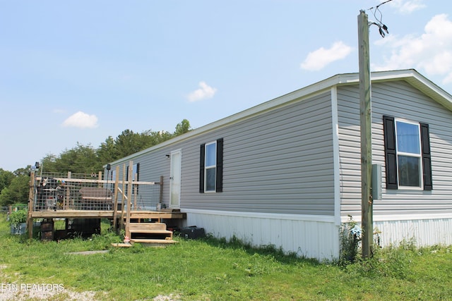 831 Fritzsche, Jamestown, TN 38556 - rear view of house featuring a wooden deck