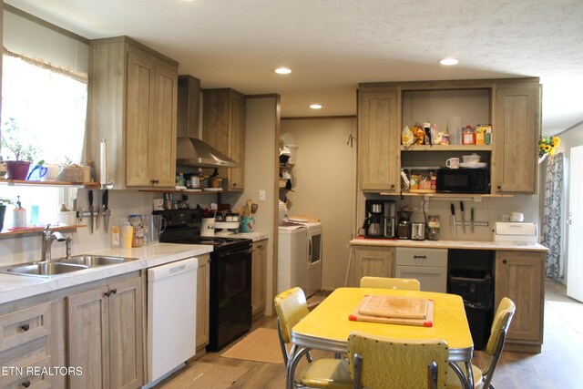 831 Fritzsche, Jamestown, TN 38556 - kitchen with washer and dryer, black appliances, a sink, wall chimney exhaust hood, and light countertops