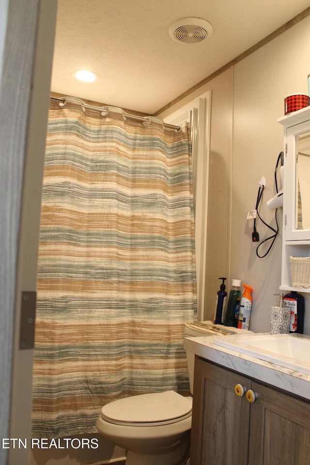 831 Fritzsche, Jamestown, TN 38556 - full bath with vanity, toilet, ornamental molding, and curtained shower