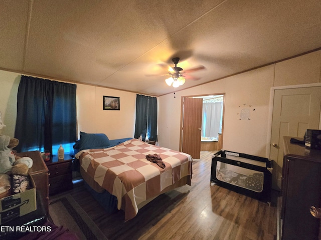 417 Ely Town Rd, Dryden, VA 24243 - bedroom with wood finished floors, a textured ceiling, vaulted ceiling, and a ceiling fan