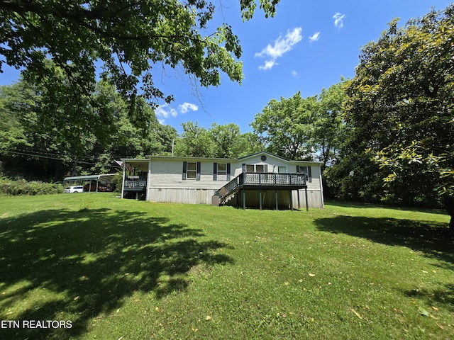 417 Ely Town Rd, Dryden, VA 24243 - view of green lawn with a deck and stairs