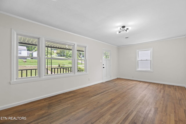 2504 Larkwood Ln, Knoxville, TN 37921 - spare room with crown molding and hardwood / wood-style flooring