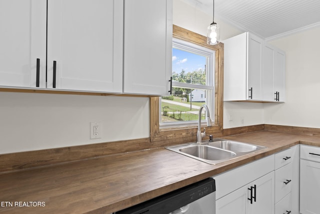 2504 Larkwood Ln, Knoxville, TN 37921 - kitchen with stainless steel dishwasher, white cabinetry, pendant lighting, and butcher block counters