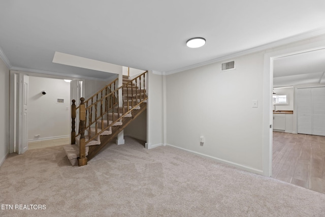 2504 Larkwood Ln, Knoxville, TN 37921 - basement featuring ornamental molding, stairs, and carpet floors