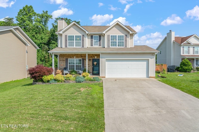 8431 Vessel Ln, Powell, TN 37849 - traditional-style house featuring driveway, a porch, a front yard, a chimney, and a garage