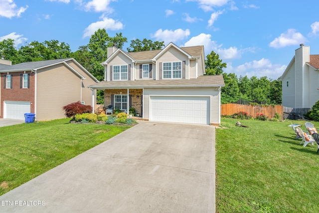 8431 Vessel Ln, Powell, TN 37849 - traditional-style house featuring a garage, driveway, a chimney, and a porch
